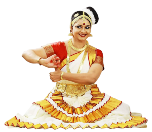 A woman in a traditional white and gold Indian classical dance costume, posing gracefully.
